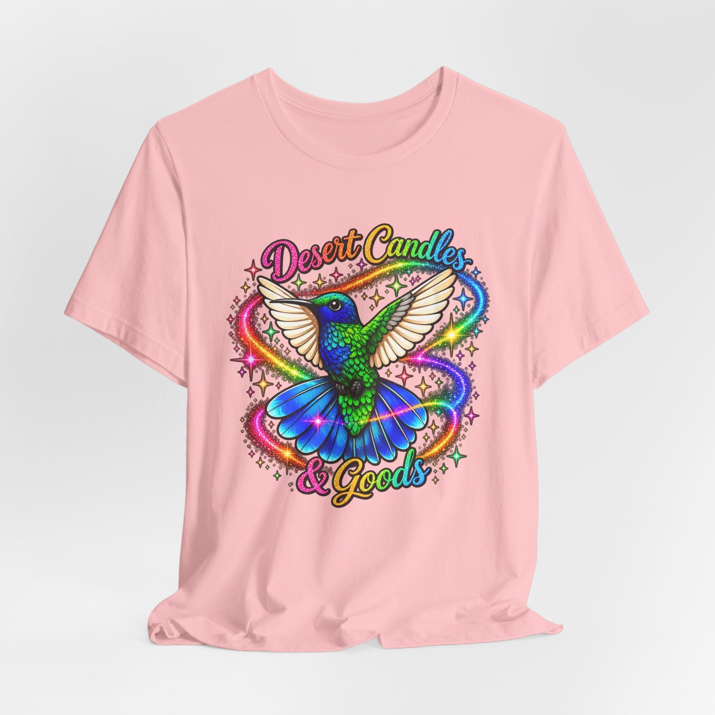 Hummingbird Rainbow Logo Tee — "Desert Candles & Goods" Colorful Graphic T-Shirt