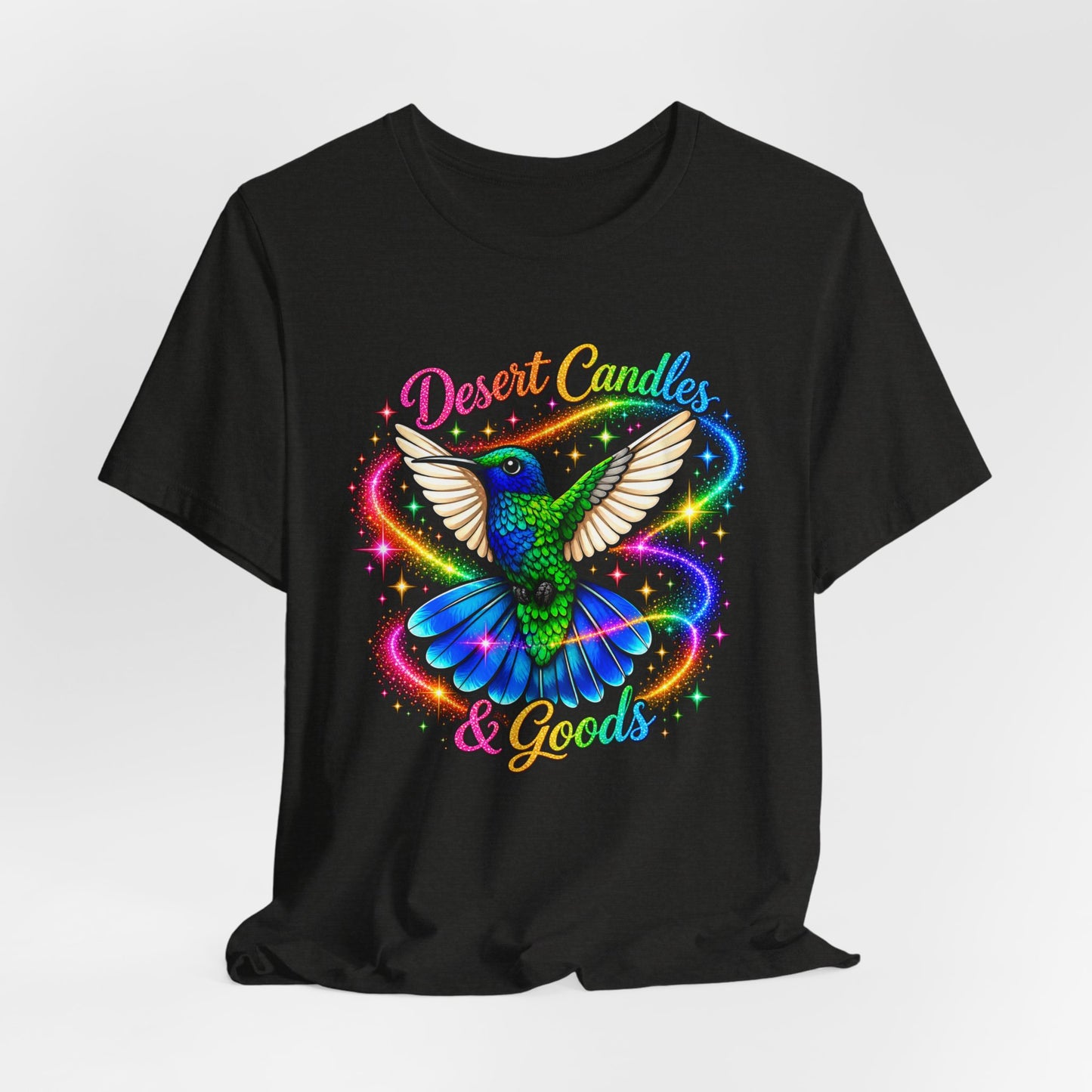 Hummingbird Rainbow Logo Tee — "Desert Candles & Goods" Colorful Graphic T-Shirt
