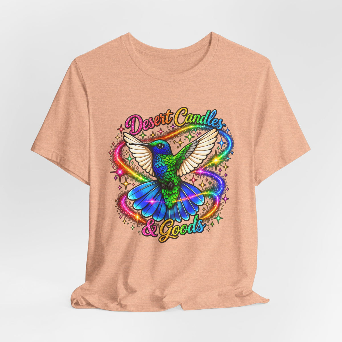 Hummingbird Rainbow Logo Tee — "Desert Candles & Goods" Colorful Graphic T-Shirt