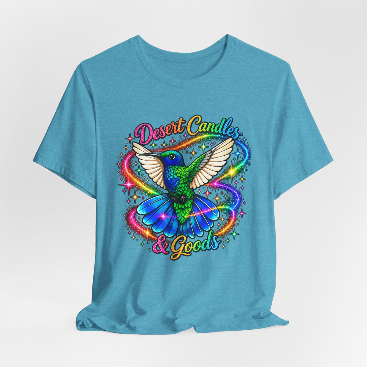 Hummingbird Rainbow Logo Tee — "Desert Candles & Goods" Colorful Graphic T-Shirt